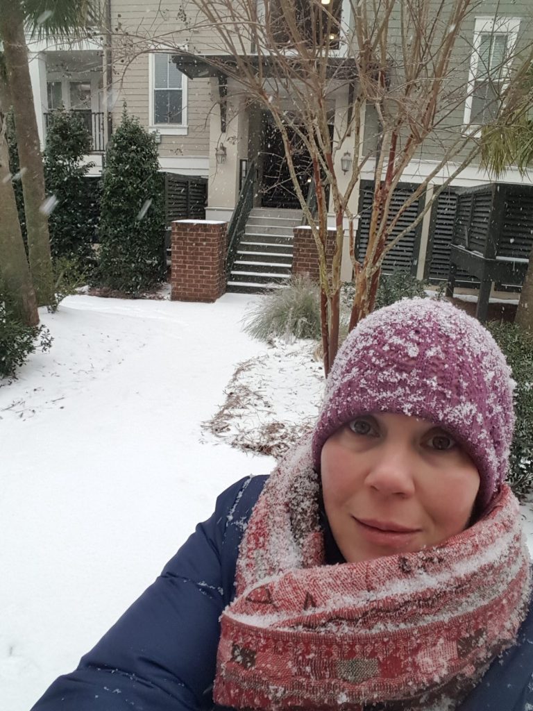 Snow in front of apartment complex