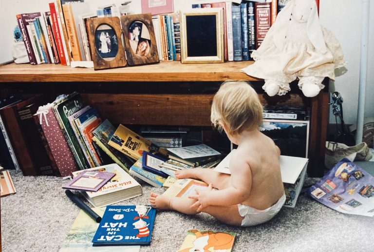 A kid with books